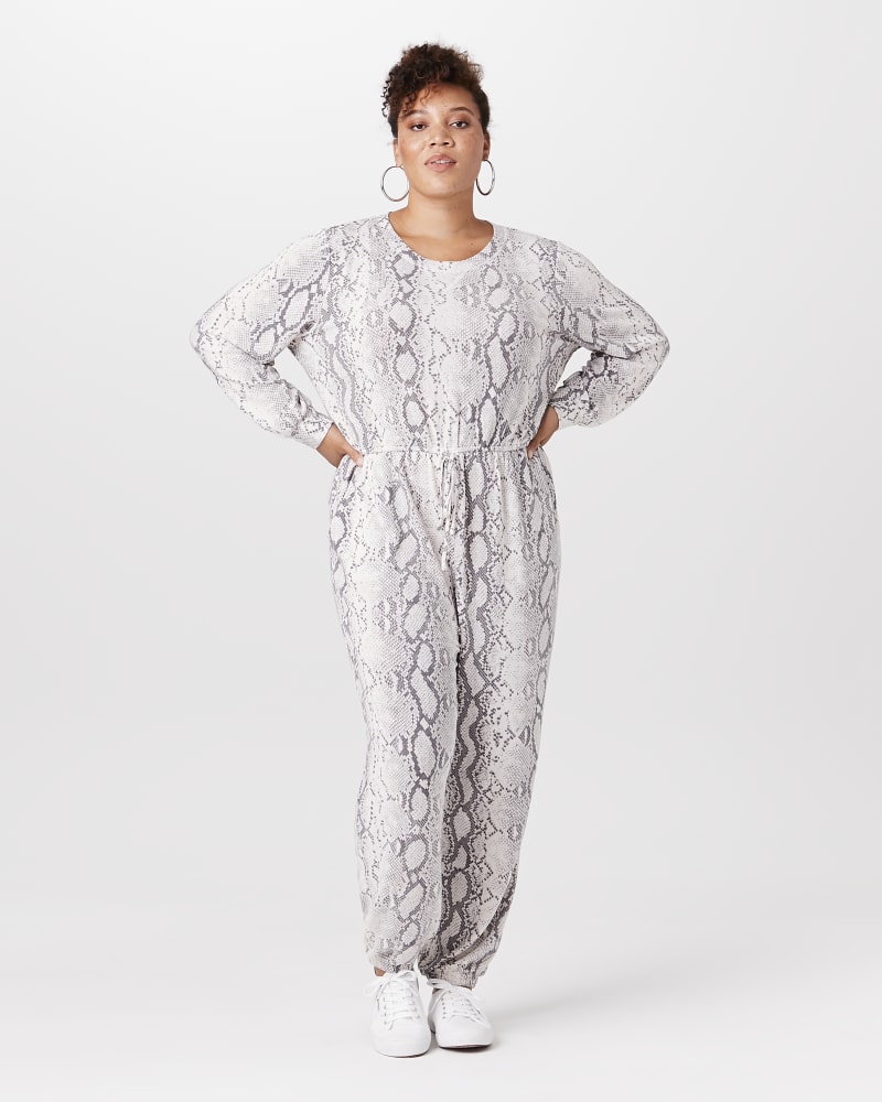 Plus size model with apple body shape wearing Erica Long-Sleeve Jumpsuit by East Adeline | Dia&Co | dia_product_style_image_id:146255